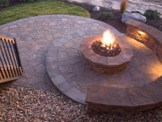 A well planned circular patio to accommodate a beautiful backyard fire pit.