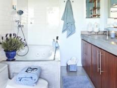 Transitional Blue Bathroom With White Subway Tile Wall Above Bathtub