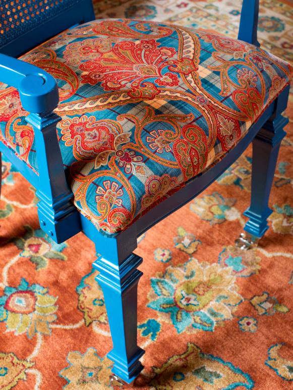 Close-up of Blue Chair and Multicolor Cushion