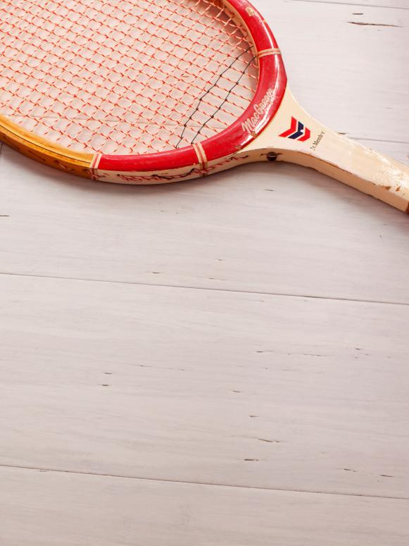 White Bamboo Flooring and Tennis Racket