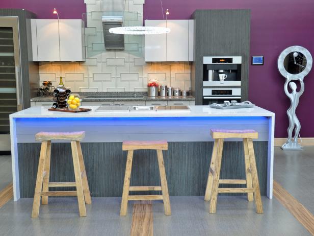 Modern Purple Kitchen With Eat-In Island With Blue Lighting