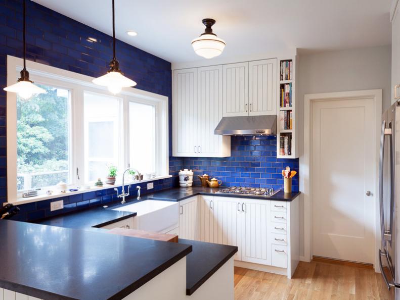 White Kitchen with a Blue Backsplash 