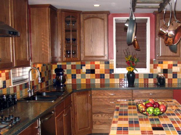 As seen on HGTV's Spice Up My Kitchen, a wood cabinet kitchen with ceramic tile backsplash under the cabinets.