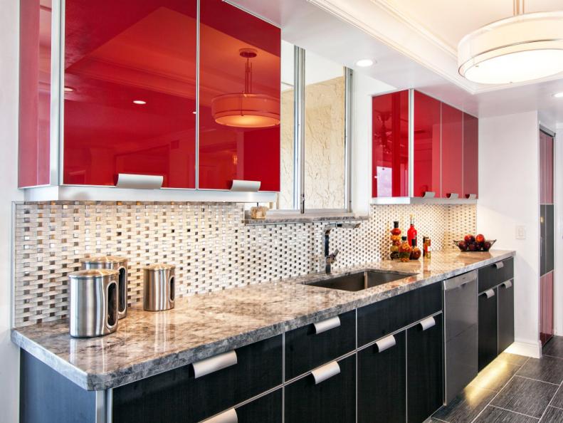Modern Kitchen with Bright Red Cabinets and Metallic Backsplash