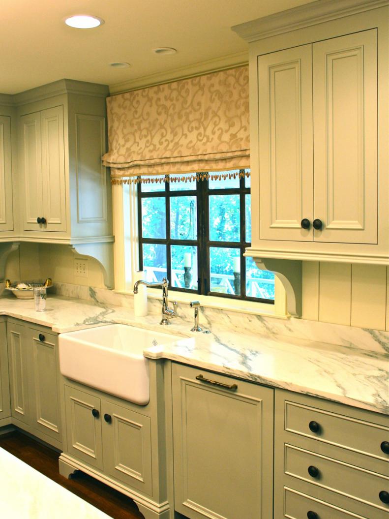 Green Cottage Style Kitchen with an Apron Sink