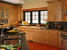 Spacious Kitchen With Black Granite Countertops
