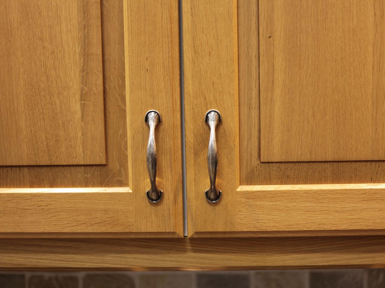 Kitchen cabinets and handles pull the overall look of your room together and help protect  Cabinet Door With Handles