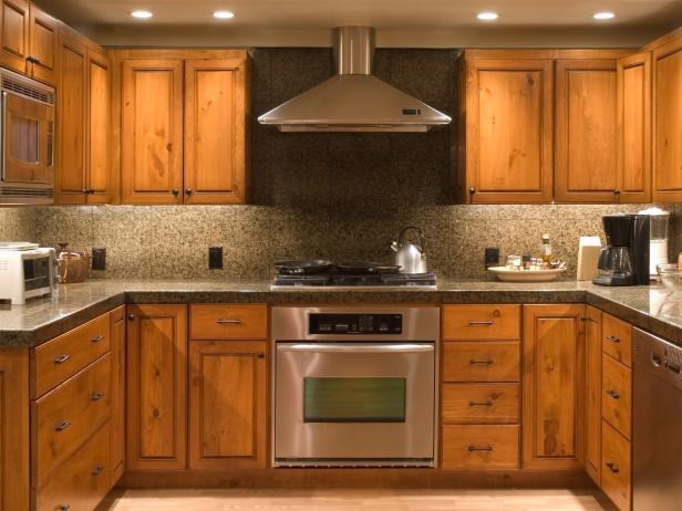 Small U-Shaped Kitchen With Unfinished Cabinets