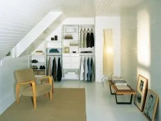 Closet system in attic bedroom