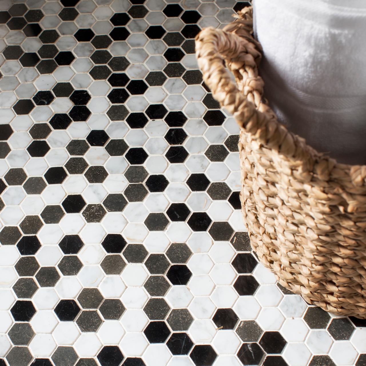 When I step out of the shower, what makes the tile floor so much colder  than the bathroom mat?