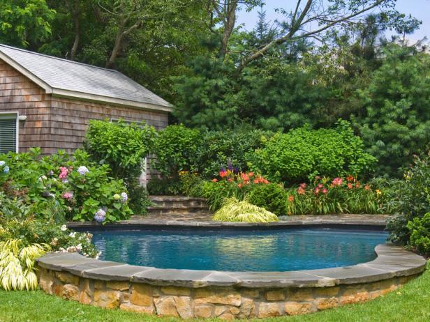 In-Ground Pool With Stacked Stone Surround