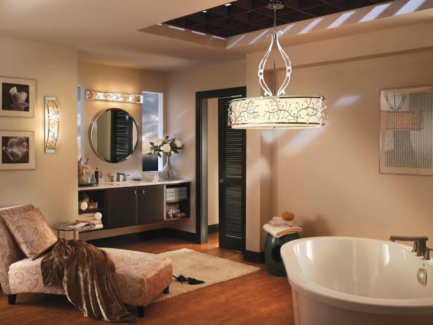 Neutral Master Bathroom With Chaise Lounge and Soaker Tub