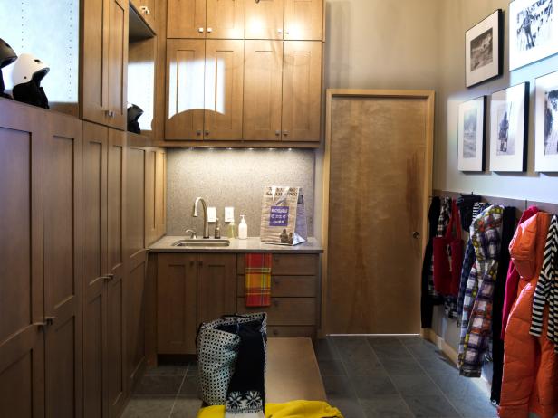 The first room one enters after a day on the slopes, the mudroom boasts floor-to-ceiling, locker-style maple cabinetry that houses ski equipment, outerwear and accessories.