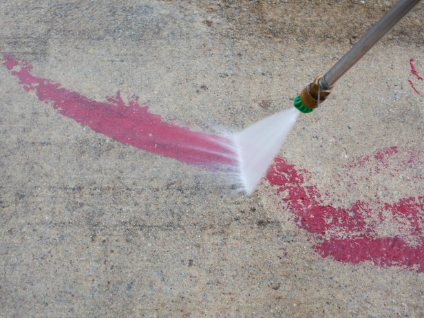 Change tip labeled “soap” to tip labeled “25 degree”. Pressure wash concrete by holding down spray handle, working your way back and forth from one side of concrete surface to the other, overlapping each stroke by 6 to 8 inches. TIP: For tougher stains such as paint, hold tip 3 to 4 inches from concrete surface, moving with slower, nearly still strokes to ensure removal.