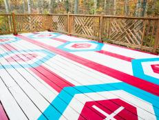 Bring color, graphic and contrast to a wooden deck with exterior-grade paint and painterâ  s tape.