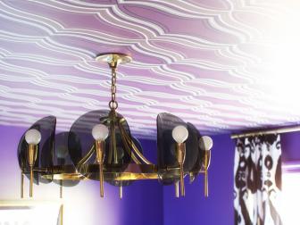 Add an unexpected touch to a ceiling with graphic wallpaper.