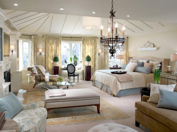 With neutral colors, traditional furnishings and graceful lighting, this empty cavernous space was turned into an elegant, high-end retreat where Laura can get away from it all.