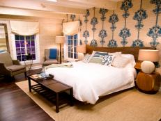 Tiffani Thiessen and her husband, Brady Smith, want to update their original 1923 guest room with an eclectic style and eco-friendly materials. Lonni uses a printed grasscloth to create a focal wall behind the new headboard, which is made from a reclaimed piece of wood.