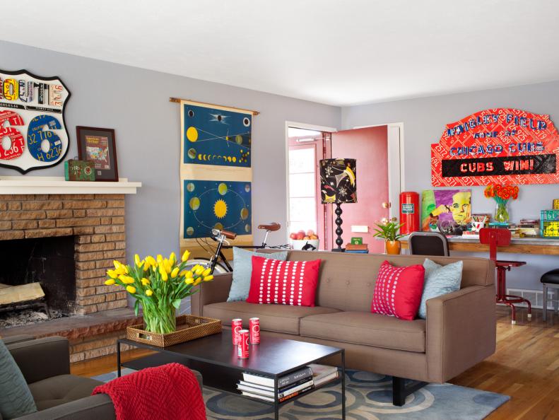 A vintage steel console acts as a computer area and lounge room divider.