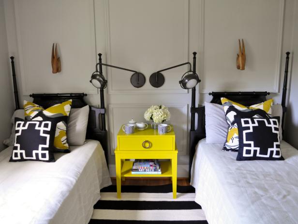 Yellow and Black Guest Room With Twin Beds 