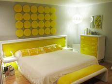 Bring light into your room with a vivid yellow. RMSer switchedonaudrey knows how to make a statement with her yellow and gray bedroom. From the circle artwork to the upholstered footboard, every item in the room has a touch of sunshine.
