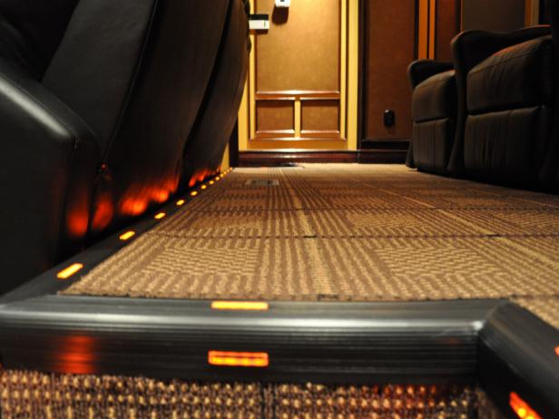 Lighting wraps around entire floor risers and rpovides adequate illumination to guide visitors around the theater.