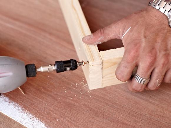 Connect the wood frame boards with screws