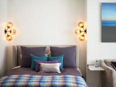 Bedroom with Globe Light Fixtures 