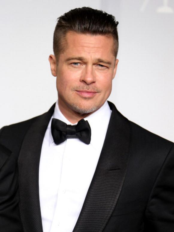 HOLLYWOOD, CA - MARCH 2: Producer/actor Brad Pitt, winner of Best Picture for '12 Years a Slave,' poses in the press room at the 86th Annual Academy Awards at Hollywood & Highland Center on March 2, 2014 in Los Angeles, California. (Photo by Dan MacMedan/WireImage)
