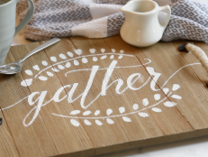 Add rustic charm to your coffee table and learn how to transfer calligraphy onto wood using this handy chalk stencil technique.