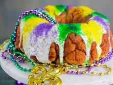 This year for Mardi Gras, make a king cake-inspired dessert using biscuit dough and an Amaretto cream cheese filling.