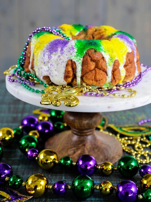 For Mardi Gras this year, make a king cake-inspired dessert using biscuit dough and an Amaretto cream cheese filling.