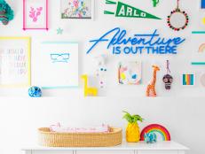 Studio DIY's Jeff and Kelly Mindell created this bright, happy space filled with a rainbow of colors. Get the story behind their bold makeover and their tips for pastel-weary parents-to-be.