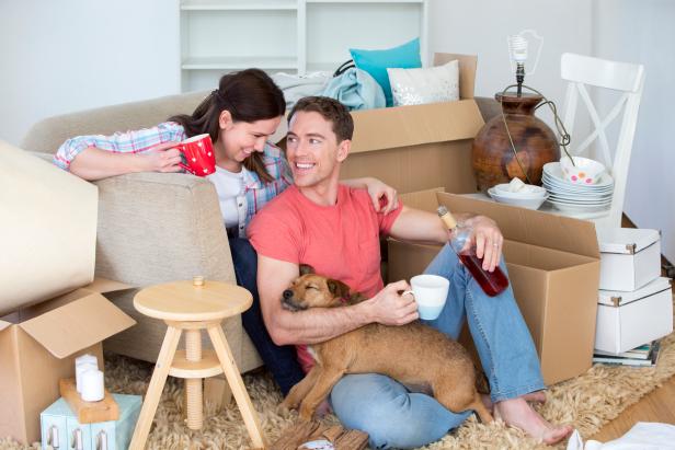 Couple + Pup Unpacking New Home