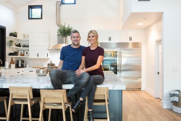 Christina Anstead with husband Ant Anstead in their newly renovated kitchen, as seen on Christina on the Coast.