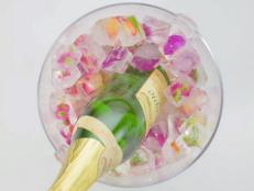 Jazz up your ice cubes by filling ice trays with edible flowers.