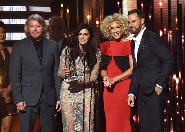 NASHVILLE, TN - NOVEMBER 04:  Phillip Sweet, Karen Fairchild, Kimberly Schlapman, and Jimi Westbrook of Little Big Town accept the award for Single of the Year for the song "Girl Crush" onstage at the 49th annual CMA Awards at the Bridgestone Arena on November 4, 2015 in Nashville, Tennessee.  (Photo by Rick Diamond/Getty Images)