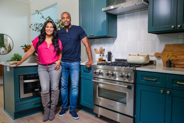 As seen on HGTV’s Married to Real Estate, hosts Egypt Sherrod and Mike Jackson pose in the redesigned kitchen of the Post's newly remodeled home. (Reveal Portrait)