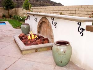 fire pit and urns give patio tuscany feel