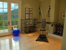 Workout room with green walls and French doors