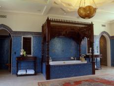 moroccan influenced bath features tub with canopy