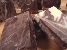 Use cocoa powder, oils and butters to make a chocolate bath soap.
