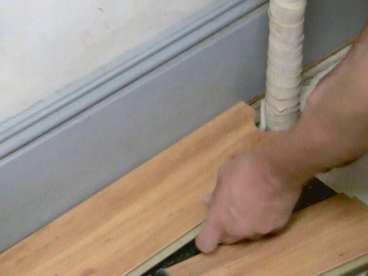 Fit Laminate Flooring Around Radiator Pipes, How To Lay Laminate Around Radiator Pipes