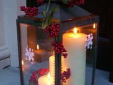 Metal Lantern With Red Berry Garland