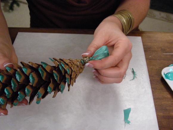 Gluing_Bead_to_top_of_Pinecone