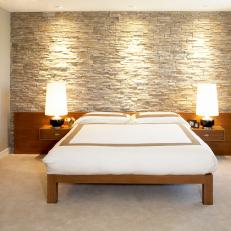 Neutral Asian Bedroom With Stone Wall