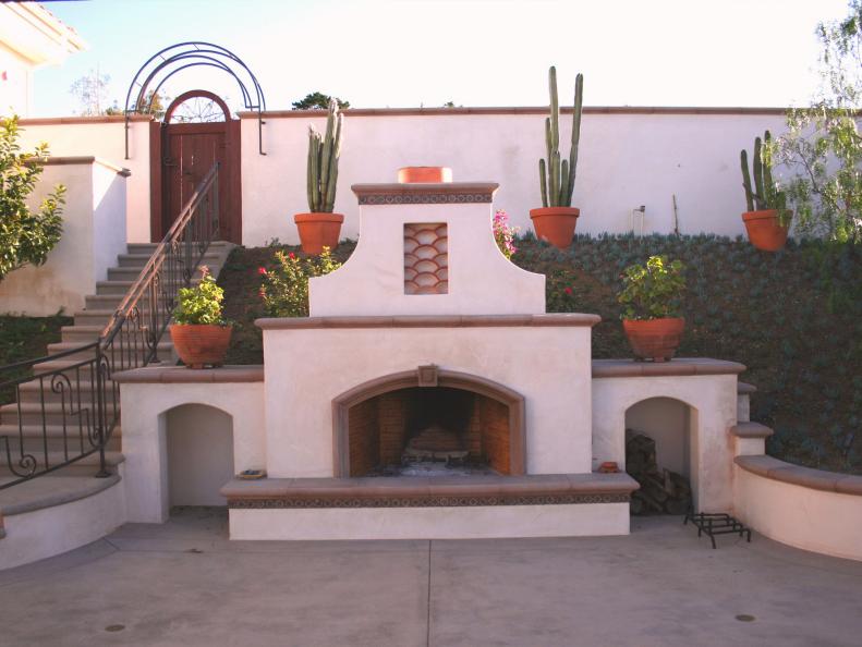 Adobe Style Fireplace on Backyard Patio 