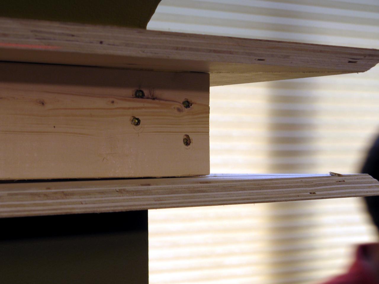 DIY floating wrap around shelves made with 2x4