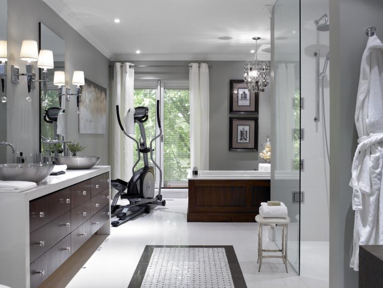 Gray Bathroom With Brown & White Vanity, Glass Shower & Elliptical