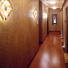 Gold Hallway With Sconces